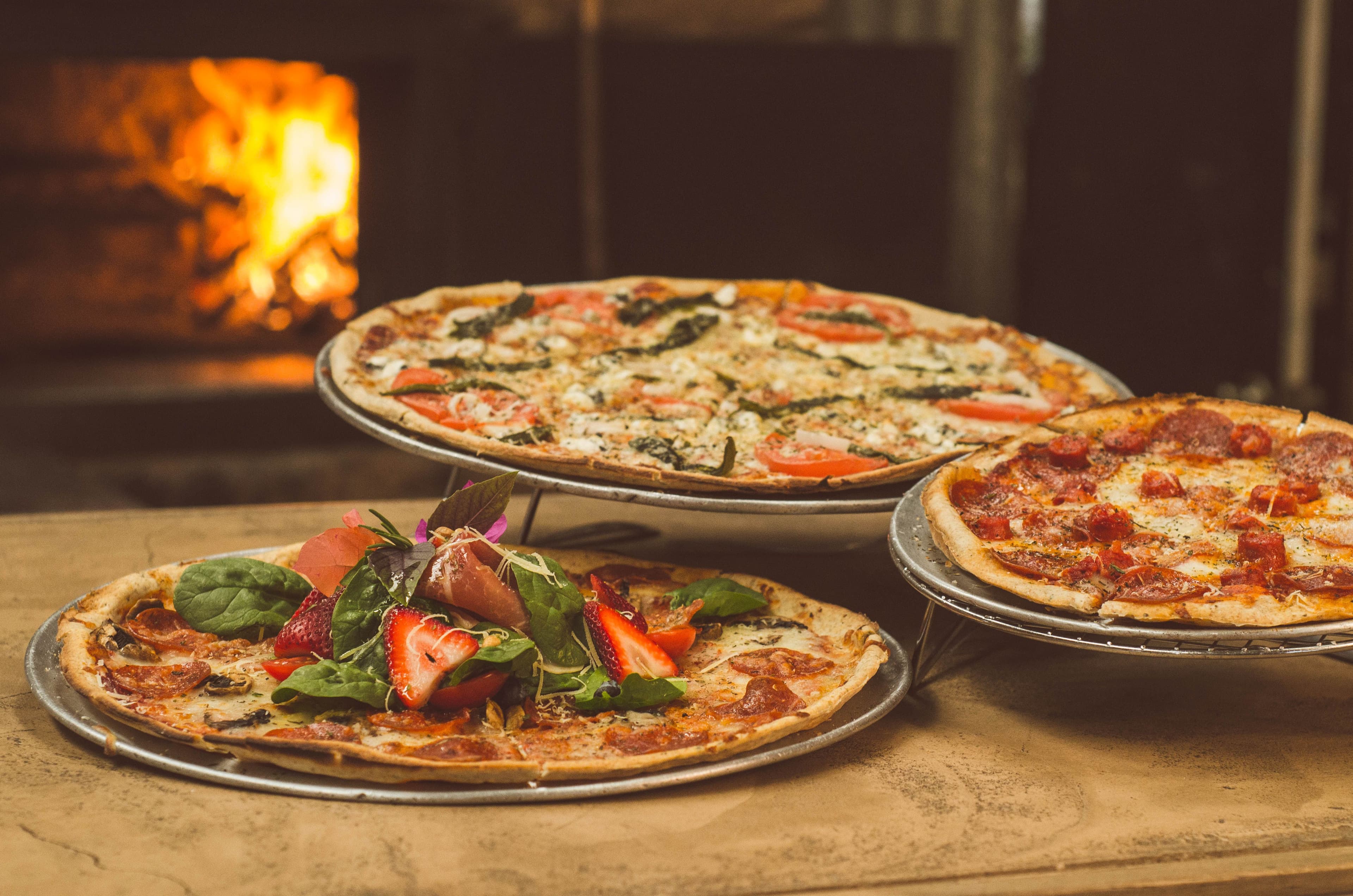 Wood-fired pizzas fresh from the kitchen